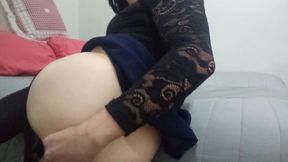 Colombian shemale walks and plays with dildo in the anus under her skirt