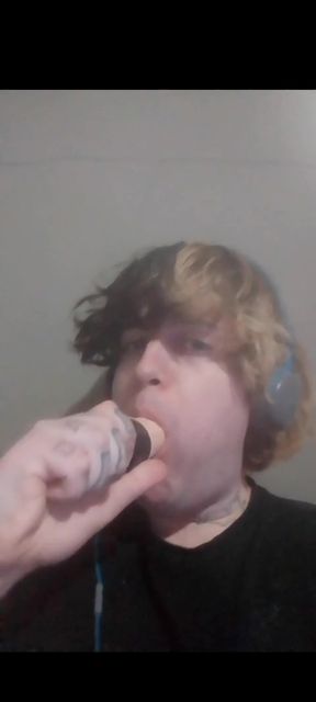 Sissy Jett sucks and deepthroats dildo