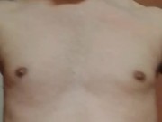Nude boy changing his clothes.