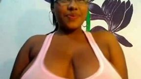 Kinky big breasted amateur black hottie brags of her huge boobies