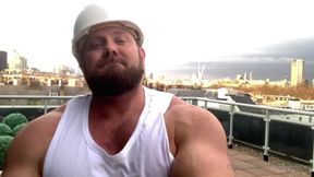 Builder Iron Bending Muscle Flexing and Measuring