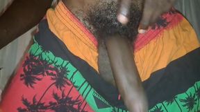 I masturbate my big black cock hard until I cum
