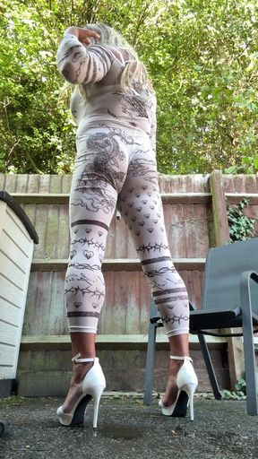 Sexy Crossdresser kellycd2022 in sexy white jumpsuit and heels