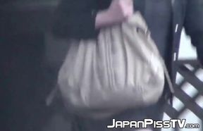 Kinky private cam records random Japanese girls while peeing in the public toilet