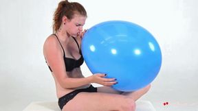 Kristina inflates a huge blue balloon (HD)