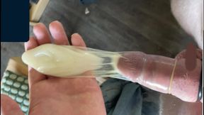 Filling Up Water on Condom Masturbation Handjob