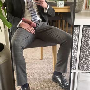 Flopped cock out of suited trousers