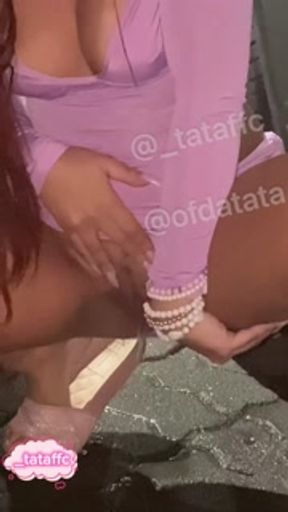 beautiful young woman showing off and urinating in public