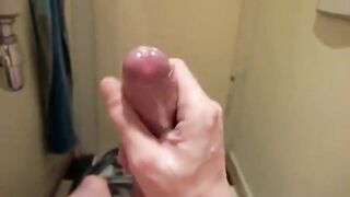 Watch this amateur stud stroke his big cock and jerk off until he cums hard