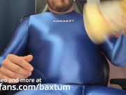 Gainer in shiny Amorsey suit chugging eggnog