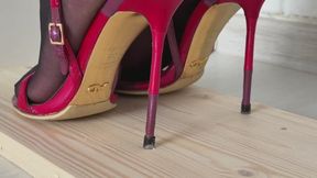 Sinking heels into wooden planks, high heels bending, one heel standing, high heels crush, wrecked high heels, shoes crush wood plank, high heels marks on wood