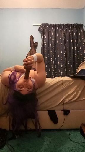 Aimee takes her dildo over the bed like a slut