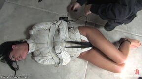 Brunette MILF bound in steel device