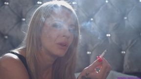 April Paisley chain smoking strong Marlboro reds wearing a little black dress