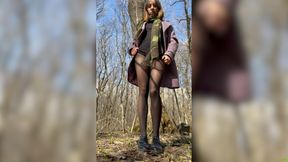 Skinny naughty girl in nylon pantyhose masturbates in the forest