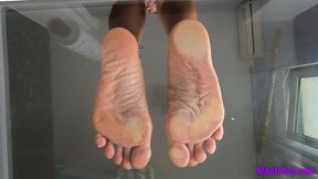 Wrinkled Soles on Glass - Floor View - HD MP4