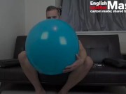 Guy jerks and smokes cigar while blowing, popping and bursting huge balloons PREVIEW