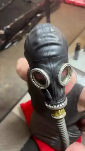 Cumshot on gas mask