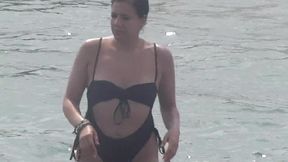 MILF in black bikini beach voyeur clip