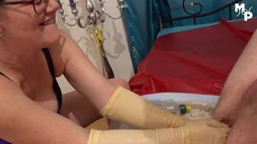 Nurse Sandra fist fucks a subs ass with long withe latex gloves