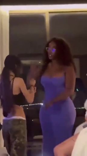Woman in blue dress dancing
