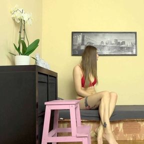 Red lingerie escort girl takes care of stuff