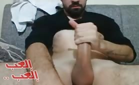 Handsome turkish guy wanks his huge cock