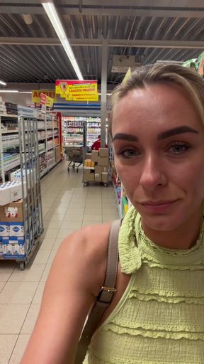 MILF mom shows off her tits at the grocery store