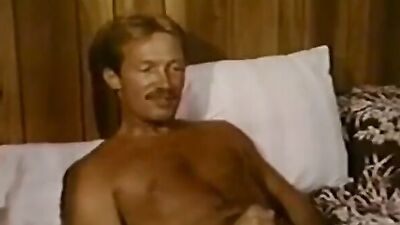 Muscular hunk serves up a wild bareback threesome to two lucky guys in a hotel room