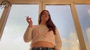 Latina Smoking at Sunset