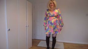 Pretty dress, black fishnets and boots with no panties