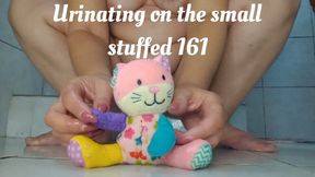 Urinating on the small stuffed 161