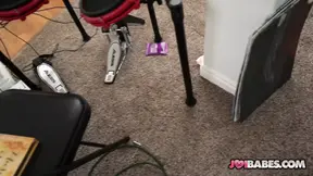 Rockstar chick Felicity Feline wanks her bandmate's huge cock