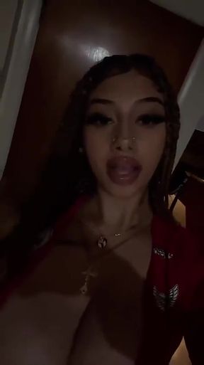 Big-titted teen Latina shows off her boobs