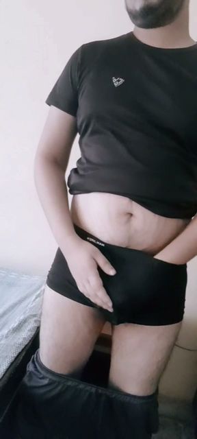 The cock is standing in the underwear.