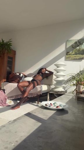 Curvy black pro lies on a cactus, getting naughty alone