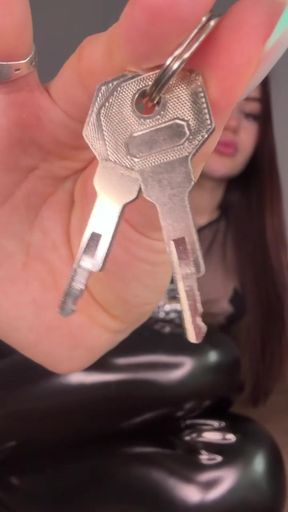 Domme femdom mistress plays with amateur chastity toy