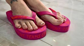 Pink flip flops on my pretty feet with long toes, french toenails polish