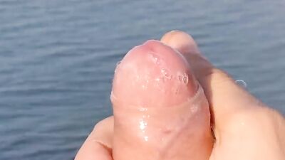 Huge Dirty Cock Gets Handjob In Public And Squirts A Lot Of Thick Sperm In Front Of The Beach