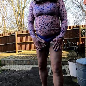 Crossdresser Kellycd masturbating outdoors, keeping an eye out for spying neighbours