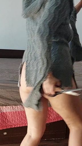 An amateur mom tries on clothes and cuts them. An amateur woman dances naked in the house.   Clip 3