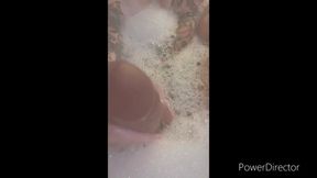 Busty Goth MILF gives a hand job in the tub with ASMR sounds while jerking