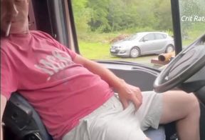 With the door open, I'm showing off. A pig drives by and stares at me.