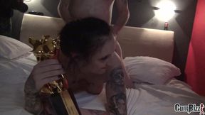 Holding her porn award close to her face shoot her face full with cum