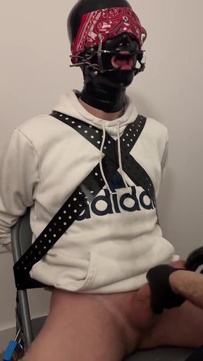 Hooded Twink Tied to the Chair