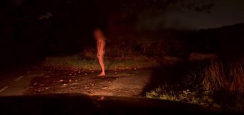 Masturbating naked outside of car , hiding behind a rock when cars pass by