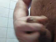 Hairy muscular man jerks off in the shower and has a great orgasm