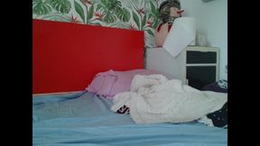 Alin play with his toy on the couch watching TV