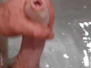 Horny teen wanks in bath and cums hard