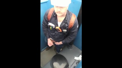 Bearded Hunk Strokes Cock Outdoors in a Porty Potty